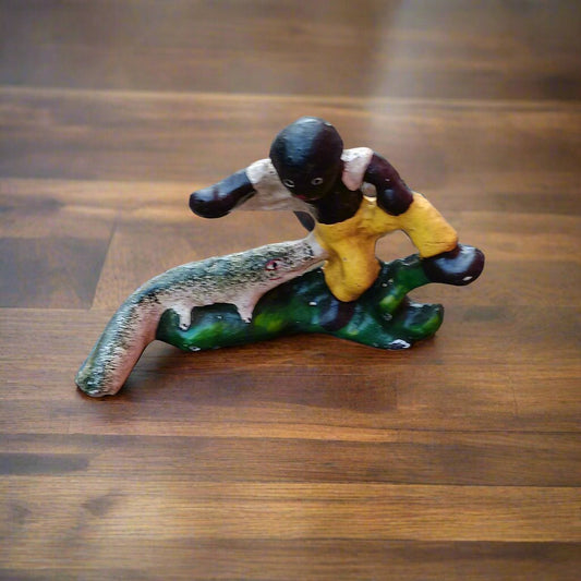 Black Americana Alligator boy cast iron bottle opener